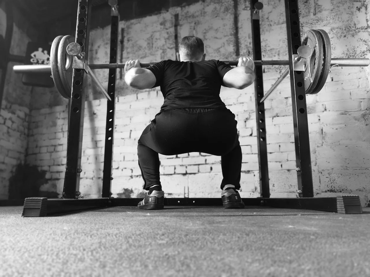 back squat z ciężką sztangą — heavy day trening siłowy