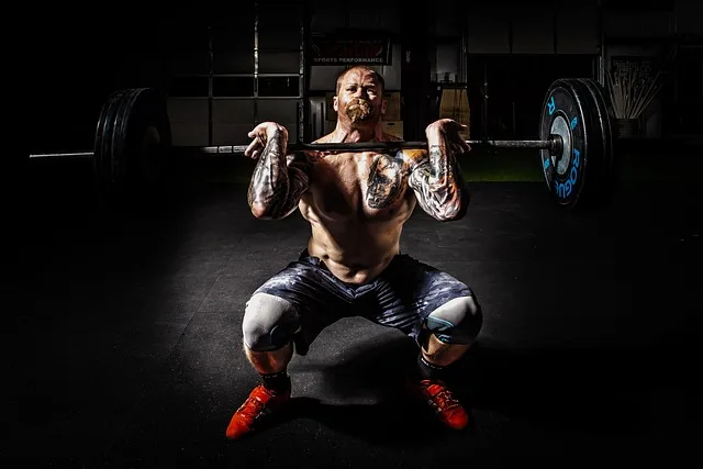 Front squat ze sztangą – dzień nóg w 5-dniowym planie treningowym